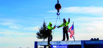 Final beam of Ferland Engineering Education and Design Center installed.